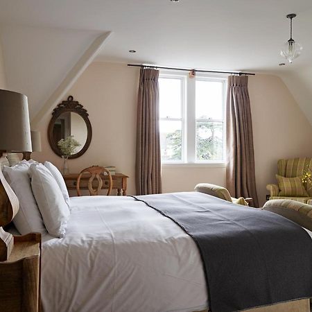Cotswold Grange Bed & Breakfast Cheltenham Exterior photo A bedroom at The Pig